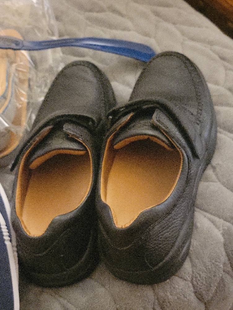 New Balance Black Slip-On Sneakers With Blue Accents